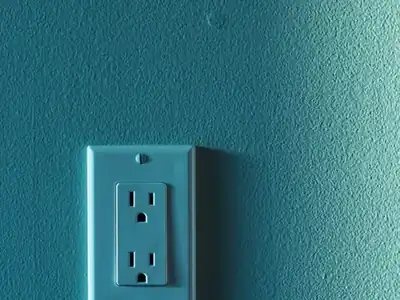 Wall outlet on a painted wall