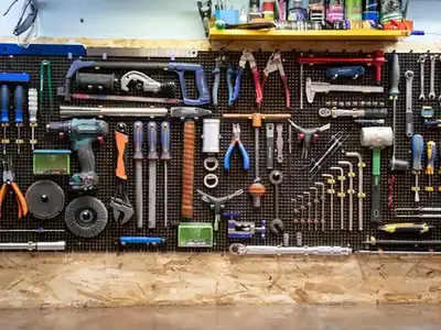 Workshop wall with hand and power tools