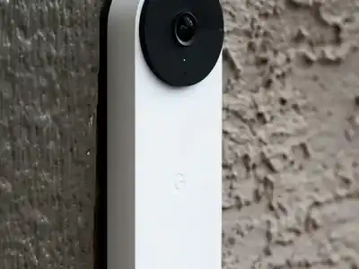Video doorbell mounted beside a front door